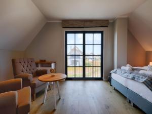 Reetland am Meer - Premium Reetdachvilla mit 3 Schlafzimmern, Sauna und Kamin F19