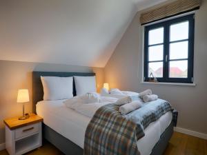 Reetland am Meer - Premium Reetdachvilla mit 3 Schlafzimmern, Sauna und Kamin F19