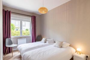 Appartements Les Bleuets - Duplex avec vue mer : photos des chambres