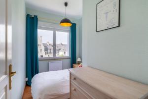 Appartements Les Bleuets - Duplex avec vue mer : photos des chambres