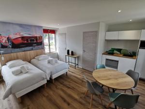 Appartements Malicorn' Appart-Hotel : photos des chambres