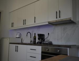 George & Dimitras House