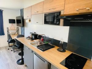 Appartements Studio 5 charmant tout equipe a la gare de Lorient : photos des chambres