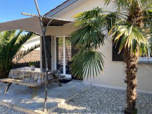 Maisons d'hotes Charme & Confort- Les Cottages du Bassin d'Arcachon- Petit-dejeuner sur demande - Nuitee, Court sejour, Semaine : photos des chambres