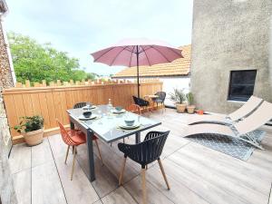 Appartements Appartement cosy en coeur de bourg : photos des chambres