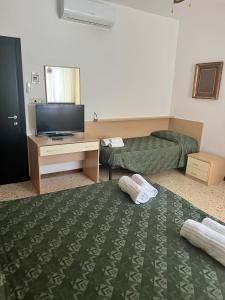 Habitación Triple con balcón
