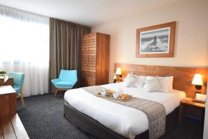 Hotels Kyriad Prestige Bordeaux Aeroport : photos des chambres