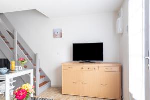 Appartements Le Regina Rifle - Appartement avec jardinet : photos des chambres