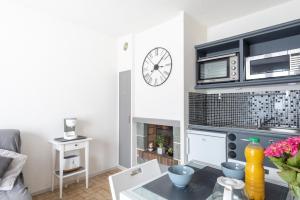 Appartements Le Regina Rifle - Appartement avec jardinet : photos des chambres