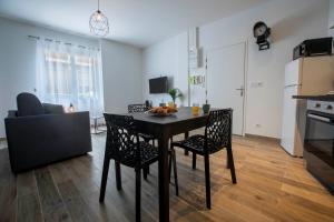 Appartements LOC TROTTEUR LE ROMARIN Gare SNCF de Lourdes : photos des chambres