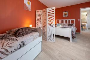 Appartements LOC TROTTEUR LE SAFRAN F2 Grand confort, gare SNCF de Lourdes : photos des chambres