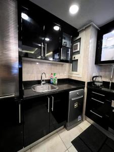 Lovely2 rooms duplex with pool in front AUC