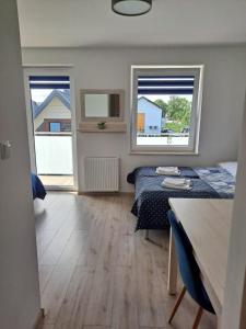 Domki i Pokoje Baltimor