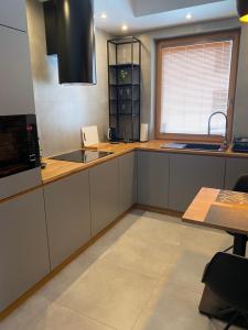 Apartament Rzekotka Zielona Dereniowa 60