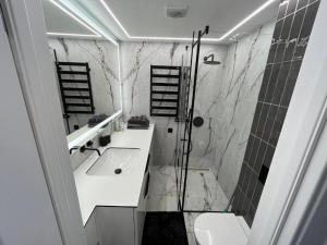 Elenos modernūs apartamentai Šventojoje (100 m iki jūros)