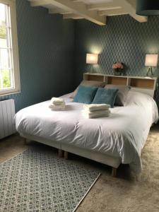 B&B / Chambres d'hotes Les pommiers : photos des chambres