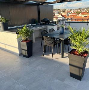 Apartment Navale with a roof terrace and a heated pool