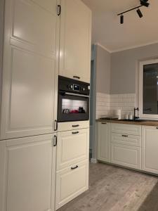 Uroczy apartament nad Motławą miejsce parkingowe w strzeżonej hali