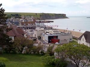 Appartements Apt avec belle terrasse vue degagee sejour lumineux 10 mn a pied centre Port en Bessin proche Bayeux et Omaha Beach : photos des chambres