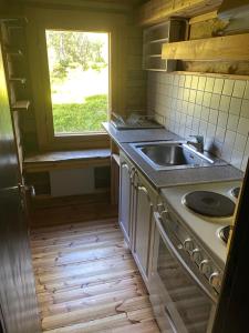 Loma-asunto tunturimaisemassa