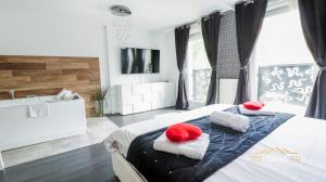 Appartements 123home - Suite & spa XL : photos des chambres