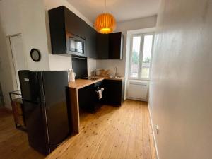 Appartements LE LOTUS BLEU - WIFI - NETFLIX : photos des chambres