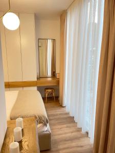 MOHO at Green Coast Resort & Residences, in Palasë