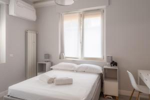 BnButler - Pergolesi, 6 - Accogliente e Moderno a Due Passi da Tutto