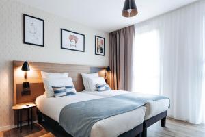Appart'hotels Appart'City Collection Saint Germain en Laye : photos des chambres