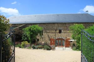 Maisons de vacances La Vieille Grange avec piscine et jardin : photos des chambres