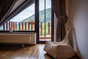 One-Bedroom Suite with Sofa Bed room in Transylvanian Inn