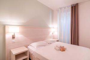 Appartements LUMINEUX appt pour 6 a  Bormes-les-mimosas ! : photos des chambres