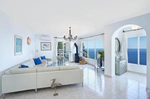 Breathtaking Seaside Villa with Heated Saltwater Pool & Panoramic Terraces