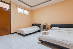Shofy Guest House Mitra RedDoorz