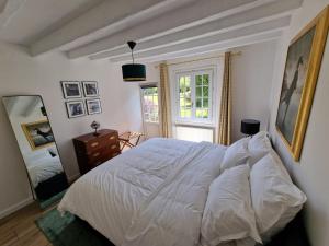 Maisons de vacances Magnifique Chaumiere Normande haut de gamme proche de la mer. : photos des chambres