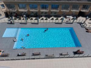 Appartement met zeezicht en verwarmd zwembad