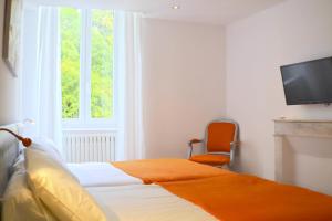 Appartements Maison La Douane - Comprends nettoyage professionnel et le linge : photos des chambres