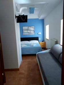 Camera Matrimoniale con Letto Supplementare