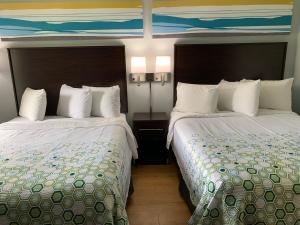 Studio Room with Two Queen Beds Non-Smoking room in HomeTowne Studios Battle Creek