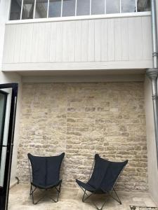Villas Elegante maison de village au coeur de La Noue : photos des chambres