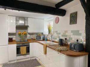 The Nook- A Rustic Cottage in a Beautiful Village.