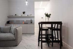 BnButler - Pergolesi, 6 - Accogliente e Moderno a Due Passi da Tutto