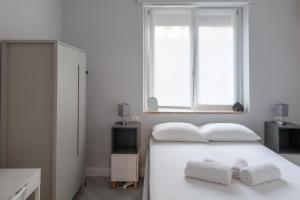 BnButler - Pergolesi, 6 - Accogliente e Moderno a Due Passi da Tutto