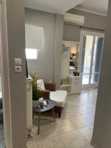 Living near Acropolis by Sylvia Staikou at Nikis str