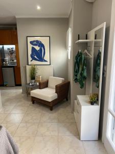 Living near Acropolis by Sylvia Staikou at Nikis str