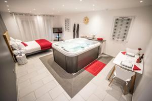 Appartements Loft avec jacuzzi privatif entre Lyon et Grenoble : photos des chambres