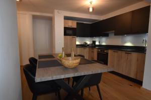 Appartements VAUJANYLOCATIONS - L'Etendard : photos des chambres