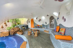 SaffronStays AsanjA Titaly - 2BR earth-sheltered pool villa with rooftop garden, Hobbit charm & Sahyadri hill views near Mumbai