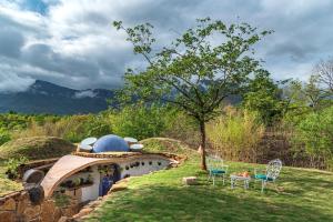 SaffronStays AsanjA Titaly - 2BR earth-sheltered pool villa with rooftop garden, Hobbit charm & Sahyadri hill views near Mumbai