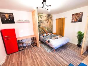 Appartements Le Jungle Chic de Pontoise : photos des chambres